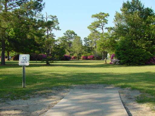 Tee box view of Hole #13 (#4) at Park Circle Disc Golf Course.