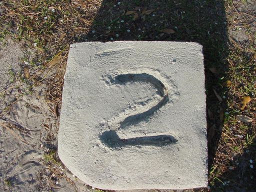 Tee marker from Hole #2 (#11) at Park Circle Disc Golf Course.